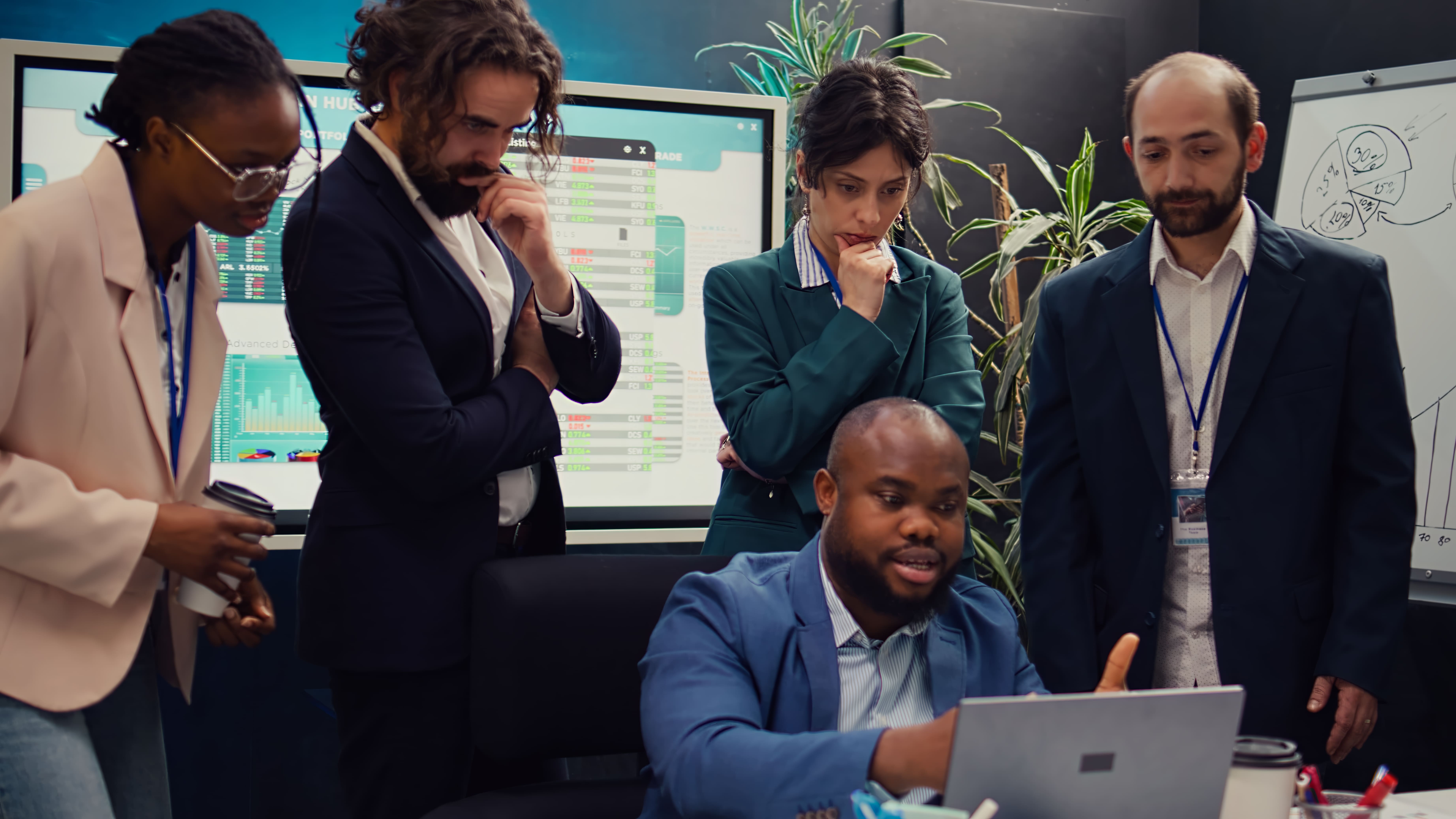 Team of engineers and designers collaborating on a digital platform